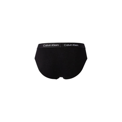 Image 3 : Trois slips Calvin Klein hip brief noirs disposés côte à côte, ceinture élastique siglée CK visible — Delvale