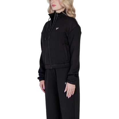 Image 2 : Détail du logo triangle en strass argentés sur sweat crop Guess Active femme noir — delvale
